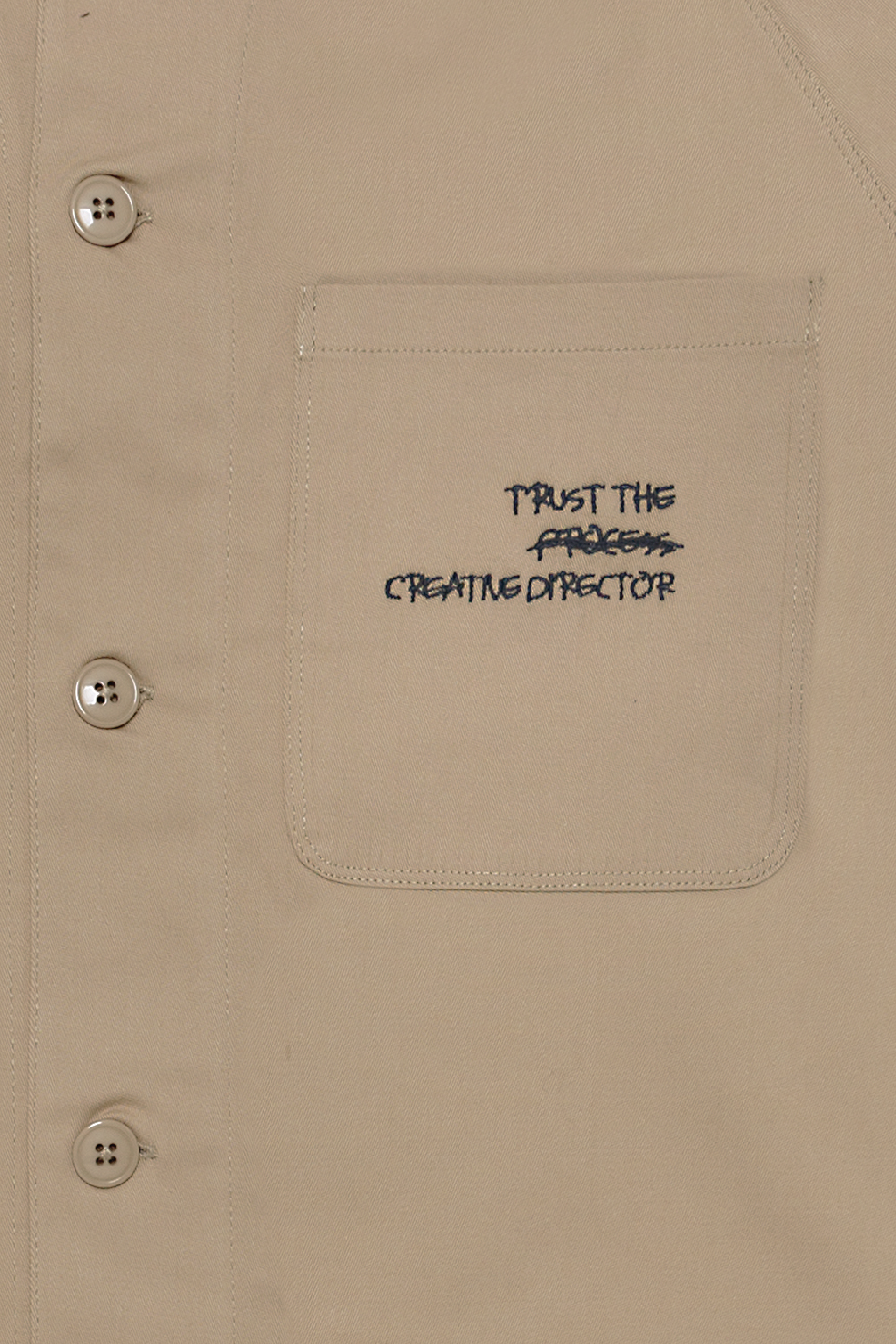 Camicia da carpentiere beige.