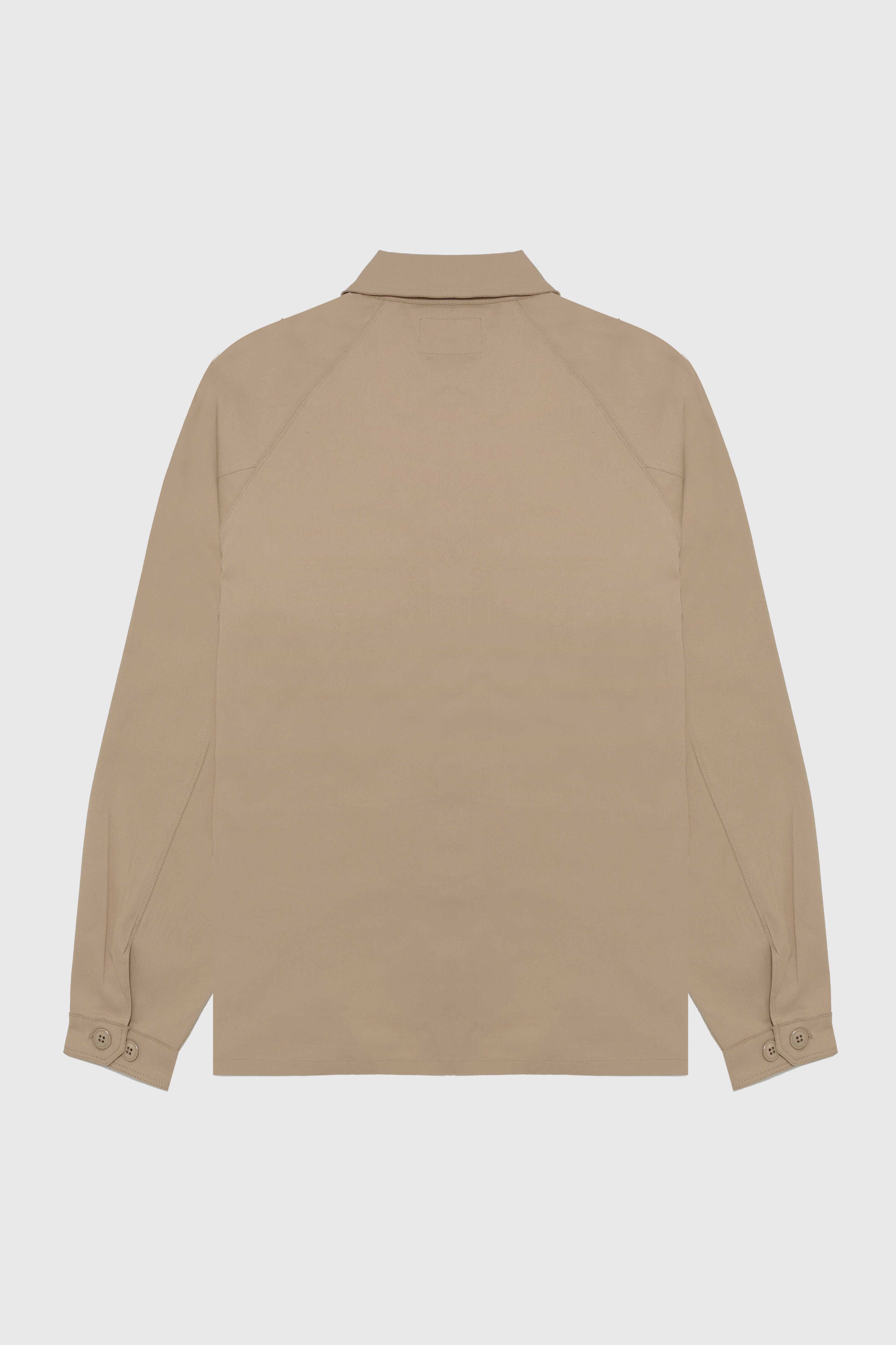 Camicia da carpentiere beige.